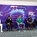 BAHRAIN, BAHRAIN - MARCH 18: (L-R) Lewis Hamilton of Great Britain and Mercedes, Esteban Ocon of France and Alpine F1, Nico Hulkenberg of Germany driving the (27) Aston Martin AMR22 Mercedes[, Alexander Albon of Thailand and Williams and Yuki Tsunoda of Japan and Scuderia AlphaTauri attend the Drivers Press Conference before practice ahead of the F1 Grand Prix of Bahrain at Bahrain International Circuit on March 18, 2022 in Bahrain, Bahrain. (Photo by Lars Baron/Getty Images)