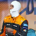 BAHRAIN, BAHRAIN - MARCH 18: Daniel Ricciardo of Australia and McLaren prepares to drive in the garage during practice ahead of the F1 Grand Prix of Bahrain at Bahrain International Circuit on March 18, 2022 in Bahrain, Bahrain. (Photo by Lars Baron/Getty Images)