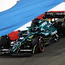 BAHRAIN, BAHRAIN - MARCH 18: Lance Stroll of Canada driving the (18) Aston Martin AMR22 Mercedes on track during practice ahead of the F1 Grand Prix of Bahrain at Bahrain International Circuit on March 18, 2022 in Bahrain, Bahrain. (Photo by Joe Portlock - Formula 1/Formula 1 via Getty Images)