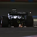 BAHRAIN, BAHRAIN - MARCH 19: Yuki Tsunoda of Japan driving the (22) Scuderia AlphaTauri AT03 on track during qualifying ahead of the F1 Grand Prix of Bahrain at Bahrain International Circuit on March 19, 2022 in Bahrain, Bahrain. (Photo by Lars Baron/Getty Images)