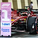 BAHRAIN, BAHRAIN - MARCH 19: Pole position qualifier Charles Leclerc of Monaco and Ferrari stops in parc ferme during qualifying ahead of the F1 Grand Prix of Bahrain at Bahrain International Circuit on March 19, 2022 in Bahrain, Bahrain. (Photo by Lars Baron/Getty Images)