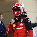 BAHRAIN, BAHRAIN - MARCH 19: Pole position qualifier Charles Leclerc of Monaco and Ferrari celebrates in parc ferme during qualifying ahead of the F1 Grand Prix of Bahrain at Bahrain International Circuit on March 19, 2022 in Bahrain, Bahrain. (Photo by Lars Baron/Getty Images)