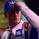 BAHRAIN, BAHRAIN - MARCH 19: Mick Schumacher of Germany and Haas F1 looks on from parc ferme after qualifying in 12th position during qualifying ahead of the F1 Grand Prix of Bahrain at Bahrain International Circuit on March 19, 2022 in Bahrain, Bahrain. (Photo by Mario Renzi - Formula 1/Formula 1 via Getty Images)