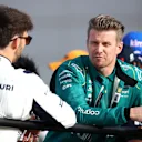BAHRAIN, BAHRAIN - MARCH 20: Nico Hulkenberg of Germany and Aston Martin F1 Team talks with Pierre Gasly of France and Scuderia AlphaTauri during the drivers parade prior to the F1 Grand Prix of Bahrain at Bahrain International Circuit on March 20, 2022 in Bahrain, Bahrain. (Photo by Joe Portlock - Formula 1/Formula 1 via Getty Images)