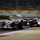 BAHRAIN, BAHRAIN - MARCH 20: Yuki Tsunoda of Japan driving the (22) Scuderia AlphaTauri AT03 leads Mick Schumacher of Germany driving the (47) Haas F1 VF-22 Ferrari during the F1 Grand Prix of Bahrain at Bahrain International Circuit on March 20, 2022 in Bahrain, Bahrain. (Photo by Peter Fox/Getty Images)