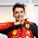 BAHRAIN, BAHRAIN - MARCH 20: Race winner Charles Leclerc of Monaco and Ferrari smiles in parc ferme during the F1 Grand Prix of Bahrain at Bahrain International Circuit on March 20, 2022 in Bahrain, Bahrain. (Photo by Dan Istitene - Formula 1/Formula 1 via Getty Images)