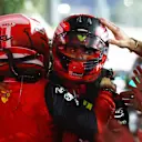 BAHRAIN, BAHRAIN - MARCH 20: Race winner Charles Leclerc of Monaco and Ferrari and Second placed Carlos Sainz of Spain and Ferrari celebrate in parc ferme during the F1 Grand Prix of Bahrain at Bahrain International Circuit on March 20, 2022 in Bahrain, Bahrain. (Photo by Clive Rose - Formula 1/Formula 1 via Getty Images)