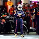 BAHRAIN, BAHRAIN - MARCH 20: Max Verstappen of the Netherlands and Oracle Red Bull Racing looks dejected as he walks from his car after retiring from the race during the F1 Grand Prix of Bahrain at Bahrain International Circuit on March 20, 2022 in Bahrain, Bahrain. (Photo by Clive Rose - Formula 1/Formula 1 via Getty Images)