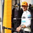 BAHRAIN, BAHRAIN - MARCH 12: Lando Norris of Great Britain and McLaren looks on in the Pitlane during Day Three of F1 Testing at Bahrain International Circuit on March 12, 2022 in Bahrain, Bahrain. (Photo by Lars Baron/Getty Images)