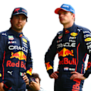 SPA, BELGIUM - AUGUST 27: Pole position qualifier Max Verstappen of the Netherlands and Oracle Red Bull Racing and Third placed qualifier Sergio Perez of Mexico and Oracle Red Bull Racing talk in parc ferme during qualifying ahead of the F1 Grand Prix of Belgium at Circuit de Spa-Francorchamps on August 27, 2022 in Spa, Belgium. (Photo by Dan Istitene - Formula 1/Formula 1 via Getty Images)