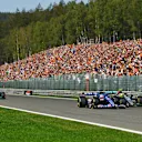 SPA, BELGIUM - AUGUST 28: Fernando Alonso of Spain driving the (14) Alpine F1 A522 Renault and Lewis Hamilton of Great Britain driving the (44) Mercedes AMG Petronas F1 Team W13 battle for track position up the Kemmel straight during the F1 Grand Prix of Belgium at Circuit de Spa-Francorchamps on August 28, 2022 in Spa, Belgium. (Photo by Dan Mullan/Getty Images)