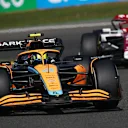 SPA, BELGIUM - AUGUST 28: Lando Norris of Great Britain driving the (4) McLaren MCL36 Mercedes leads Zhou Guanyu of China driving the (24) Alfa Romeo F1 C42 Ferrari during the F1 Grand Prix of Belgium at Circuit de Spa-Francorchamps on August 28, 2022 in Spa, Belgium. (Photo by Joe Portlock - Formula 1/Formula 1 via Getty Images)