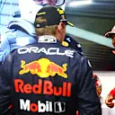 SPA, BELGIUM - AUGUST 28: Race winner Max Verstappen of the Netherlands and Oracle Red Bull Racing, Second placed Sergio Perez of Mexico and Oracle Red Bull Racing and Third placed Carlos Sainz of Spain and Ferrari talk in parc ferme during the F1 Grand Prix of Belgium at Circuit de Spa-Francorchamps on August 28, 2022 in Spa, Belgium. (Photo by Dan Istitene - Formula 1/Formula 1 via Getty Images)