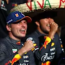 SPA, BELGIUM - AUGUST 28: Race winner Max Verstappen of the Netherlands and Oracle Red Bull Racing and Second placed Sergio Perez of Mexico and Oracle Red Bull Racing celebrate with their team after the F1 Grand Prix of Belgium at Circuit de Spa-Francorchamps on August 28, 2022 in Spa, Belgium. (Photo by Joe Portlock - Formula 1/Formula 1 via Getty Images)