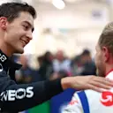 SAO PAULO, BRAZIL - NOVEMBER 11: Third placed qualifier George Russell of Great Britain and Mercedes congratulates Pole position qualifier Kevin Magnussen of Denmark and Haas F1 in parc ferme during qualifying ahead of the F1 Grand Prix of Brazil at Autodromo Jose Carlos Pace on November 11, 2022 in Sao Paulo, Brazil. (Photo by Dan Istitene - Formula 1/Formula 1 via Getty Images)