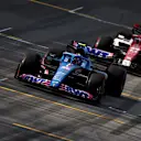 SAO PAULO, BRAZIL - NOVEMBER 12: Esteban Ocon of France driving the (31) Alpine F1 A522 Renault leads Zhou Guanyu of China driving the (24) Alfa Romeo F1 C42 Ferrari during the Sprint ahead of the F1 Grand Prix of Brazil at Autodromo Jose Carlos Pace on November 12, 2022 in Sao Paulo, Brazil. (Photo by Dan Istitene - Formula 1/Formula 1 via Getty Images)