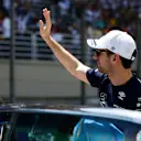 SAO PAULO, BRAZIL - NOVEMBER 13: Nicholas Latifi of Canada and Williams waves to the crowd on the drivers parade prior to the F1 Grand Prix of Brazil at Autodromo Jose Carlos Pace on November 13, 2022 in Sao Paulo, Brazil. (Photo by Jared C. Tilton/Getty Images)