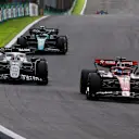 SAO PAULO, BRAZIL - NOVEMBER 13: Pierre Gasly of France driving the (10) Scuderia AlphaTauri AT03 anf Valtteri Bottas of Finland driving the (77) Alfa Romeo F1 C42 Ferrari battle for track position during the F1 Grand Prix of Brazil at Autodromo Jose Carlos Pace on November 13, 2022 in Sao Paulo, Brazil. (Photo by Chris Graythen/Getty Images)