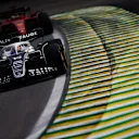 SAO PAULO, BRAZIL - NOVEMBER 13: Pierre Gasly of France driving the (10) Scuderia AlphaTauri AT03 leads Charles Leclerc of Monaco driving the (16) Ferrari F1-75 during the F1 Grand Prix of Brazil at Autodromo Jose Carlos Pace on November 13, 2022 in Sao Paulo, Brazil. (Photo by Jared C. Tilton/Getty Images)