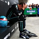 SAO PAULO, BRAZIL - NOVEMBER 13: Race winner George Russell of Great Britain and Mercedes reacts in parc ferme during the F1 Grand Prix of Brazil at Autodromo Jose Carlos Pace on November 13, 2022 in Sao Paulo, Brazil. (Photo by Dan Istitene - Formula 1/Formula 1 via Getty Images)