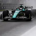 MONTREAL, QUEBEC - JUNE 18: Lance Stroll of Canada driving the (18) Aston Martin AMR22 Mercedes in the wet during qualifying ahead of the F1 Grand Prix of Canada at Circuit Gilles Villeneuve on June 18, 2022 in Montreal, Quebec. (Photo by Dan Mullan/Getty Images)