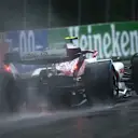 MONTREAL, QUEBEC - JUNE 18: Zhou Guanyu of China driving the (24) Alfa Romeo F1 C42 Ferrari in the wet during qualifying ahead of the F1 Grand Prix of Canada at Circuit Gilles Villeneuve on June 18, 2022 in Montreal, Quebec. (Photo by Clive Mason/Getty Images)