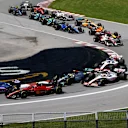 MONTREAL, QUEBEC - JUNE 19: Fernando Alonso of Spain driving the (14) Alpine F1 A522 Renault and Carlos Sainz of Spain driving (55) the Ferrari F1-75 battle for track position at the start during the F1 Grand Prix of Canada at Circuit Gilles Villeneuve on June 19, 2022 in Montreal, Quebec. (Photo by Dan Istitene - Formula 1/Formula 1 via Getty Images)