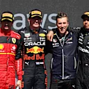 MONTREAL, QUEBEC - JUNE 19: Race winner Max Verstappen of the Netherlands and Oracle Red Bull Racing (second from left), Second placed Carlos Sainz of Spain and Ferrari (L), Third placed Lewis Hamilton of Great Britain and Mercedes (R) and Ben Gordon-Smith of Red Bull Racing (second from right) celebrate on the podium during the F1 Grand Prix of Canada at Circuit Gilles Villeneuve on June 19, 2022 in Montreal, Quebec. (Photo by Clive Rose/Getty Images)