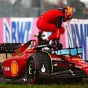 IMOLA, ITALY - APRIL 22: Carlos Sainz of Spain and Ferrari climbs from his car after crashing during qualifying ahead of the F1 Grand Prix of Emilia Romagna at Autodromo Enzo e Dino Ferrari on April 22, 2022 in Imola, Italy. (Photo by Dan Istitene - Formula 1/Formula 1 via Getty Images)