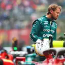 IMOLA, ITALY - APRIL 22: Sebastian Vettel of Germany and Aston Martin F1 Team inspects cars in parc ferme during qualifying ahead of the F1 Grand Prix of Emilia Romagna at Autodromo Enzo e Dino Ferrari on April 22, 2022 in Imola, Italy. (Photo by Dan Istitene - Formula 1/Formula 1 via Getty Images)