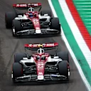 IMOLA, ITALY - APRIL 22: Zhou Guanyu of China driving the (24) Alfa Romeo F1 C42 Ferrari leads Valtteri Bottas of Finland driving the (77) Alfa Romeo F1 C42 Ferrari  during qualifying ahead of the F1 Grand Prix of Emilia Romagna at Autodromo Enzo e Dino Ferrari on April 22, 2022 in Imola, Italy. (Photo by Joe Portlock - Formula 1/Formula 1 via Getty Images)