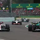 IMOLA, ITALY - APRIL 23: Sebastian Vettel of Germany driving the (5) Aston Martin AMR22 Mercedes leads Valtteri Bottas of Finland driving the (77) Alfa Romeo F1 C42 Ferrari  during Sprint ahead of the F1 Grand Prix of Emilia Romagna at Autodromo Enzo e Dino Ferrari on April 23, 2022 in Imola, Italy. (Photo by Joe Portlock - Formula 1/Formula 1 via Getty Images)