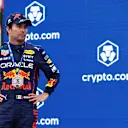 IMOLA, ITALY - APRIL 23: Third placed Sergio Perez of Mexico and Oracle Red Bull Racing looks on at the Sprint Victory Ceremony during Sprint ahead of the F1 Grand Prix of Emilia Romagna at Autodromo Enzo e Dino Ferrari on April 23, 2022 in Imola, Italy. (Photo by Mark Thompson/Getty Images)