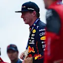 IMOLA, ITALY - APRIL 23: Sprint winner Max Verstappen of the Netherlands and Oracle Red Bull Racing is presented with his medal at the Sprint Victory Ceremony during Sprint ahead of the F1 Grand Prix of Emilia Romagna at Autodromo Enzo e Dino Ferrari on April 23, 2022 in Imola, Italy. (Photo by Mario Renzi - Formula 1/Formula 1 via Getty Images)