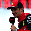 IMOLA, ITALY - APRIL 23: Charles Leclerc of Monaco and Ferrari talks to the media on the grid during Sprint ahead of the F1 Grand Prix of Emilia Romagna at Autodromo Enzo e Dino Ferrari on April 23, 2022 in Imola, Italy. (Photo by Mario Renzi - Formula 1/Formula 1 via Getty Images)
