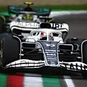 IMOLA, ITALY - APRIL 24: Pierre Gasly of France driving the (10) Scuderia AlphaTauri AT03 leads Lewis Hamilton of Great Britain driving the (44) Mercedes AMG Petronas F1 Team W13 during the F1 Grand Prix of Emilia Romagna at Autodromo Enzo e Dino Ferrari on April 24, 2022 in Imola, Italy. (Photo by Clive Mason/Getty Images)