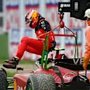 IMOLA, ITALY - APRIL 24: Carlos Sainz of Spain and Ferrari climbs from his car after retiring from the race during the F1 Grand Prix of Emilia Romagna at Autodromo Enzo e Dino Ferrari on April 24, 2022 in Imola, Italy. (Photo by Dan Mullan/Getty Images)