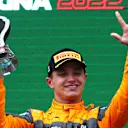 IMOLA, ITALY - APRIL 24: Third placed Lando Norris of Great Britain and McLaren celebrates on the podium during the F1 Grand Prix of Emilia Romagna at Autodromo Enzo e Dino Ferrari on April 24, 2022 in Imola, Italy. (Photo by Lars Baron - Formula 1/Formula 1 via Getty Images)