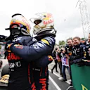 IMOLA, ITALY - APRIL 24: Race winner Max Verstappen of the Netherlands and Oracle Red Bull Racing and Second placed Sergio Perez of Mexico and Oracle Red Bull Racing celebrate in parc ferme during the F1 Grand Prix of Emilia Romagna at Autodromo Enzo e Dino Ferrari on April 24, 2022 in Imola, Italy. (Photo by Mark Thompson/Getty Images)
