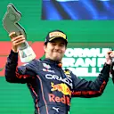 IMOLA, ITALY - APRIL 24: Second placed Sergio Perez of Mexico and Oracle Red Bull Racing celebrates on the podium during the F1 Grand Prix of Emilia Romagna at Autodromo Enzo e Dino Ferrari on April 24, 2022 in Imola, Italy. (Photo by Mark Thompson/Getty Images)