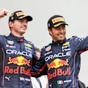 IMOLA, ITALY - APRIL 24: Max Verstappen of Red Bull Racing and The Netherlands  celebrates with Sergio Perez of Mexico and Red Bull Racing after finishing in first and second position during the F1 Grand Prix of Emilia Romagna at Autodromo Enzo e Dino Ferrari on April 24, 2022 in Imola, Italy. (Photo by Peter Fox/Getty Images)