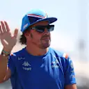 LE CASTELLET, FRANCE - JULY 24: Fernando Alonso of Spain and Alpine F1 waves to the crowd on the drivers parade ahead of the F1 Grand Prix of France at Circuit Paul Ricard on July 24, 2022 in Le Castellet, France. (Photo by Clive Rose/Getty Images)