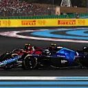 LE CASTELLET, FRANCE - JULY 24: Nicholas Latifi of Canada driving the (6) Williams FW44 Mercedes and Carlos Sainz of Spain driving (55) the Ferrari F1-75 battle for track position during the F1 Grand Prix of France at Circuit Paul Ricard on July 24, 2022 in Le Castellet, France. (Photo by Joe Portlock - Formula 1/Formula 1 via Getty Images)