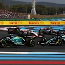 LE CASTELLET, FRANCE - JULY 24: Sebastian Vettel of Germany driving the (5) Aston Martin AMR22 Mercedes leads Lance Stroll of Canada driving the (18) Aston Martin AMR22 Mercedes at the start during the F1 Grand Prix of France at Circuit Paul Ricard on July 24, 2022 in Le Castellet, France. (Photo by Joe Portlock - Formula 1/Formula 1 via Getty Images)