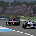 LE CASTELLET, FRANCE - JULY 24: Pierre Gasly of France driving the (10) Scuderia AlphaTauri AT03 leads Valtteri Bottas of Finland driving the (77) Alfa Romeo F1 C42 Ferrari during the F1 Grand Prix of France at Circuit Paul Ricard on July 24, 2022 in Le Castellet, France. (Photo by Dan Mullan/Getty Images)