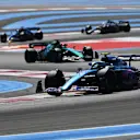LE CASTELLET, FRANCE - JULY 24: Esteban Ocon of France driving the (31) Alpine F1 A522 Renault leads Lance Stroll of Canada driving the (18) Aston Martin AMR22 Mercedes during the F1 Grand Prix of France at Circuit Paul Ricard on July 24, 2022 in Le Castellet, France. (Photo by Dan Mullan/Getty Images)