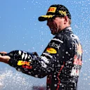 LE CASTELLET, FRANCE - JULY 24: Race winner Max Verstappen of the Netherlands and Oracle Red Bull Racing celebrates on the podium during the F1 Grand Prix of France at Circuit Paul Ricard on July 24, 2022 in Le Castellet, France. (Photo by Dan Istitene - Formula 1/Formula 1 via Getty Images)
