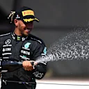 LE CASTELLET, FRANCE - JULY 24: Second placed Lewis Hamilton of Great Britain and Mercedes celebrates on the podium during the F1 Grand Prix of France at Circuit Paul Ricard on July 24, 2022 in Le Castellet, France. (Photo by Dan Mullan/Getty Images)