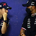 LE CASTELLET, FRANCE - JULY 21: Sergio Perez of Mexico and Oracle Red Bull Racing and Lewis Hamilton of Great Britain and Mercedes talk in the Drivers Press Conference during previews ahead of the F1 Grand Prix of France at Circuit Paul Ricard on July 21, 2022 in Le Castellet, France. (Photo by Bryn Lennon/Getty Images)
