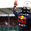 NORTHAMPTON, ENGLAND - JULY 02: Second placed qualifier Max Verstappen of the Netherlands and Oracle Red Bull Racing waves to the crowd in parc ferme during qualifying ahead of the F1 Grand Prix of Great Britain at Silverstone on July 02, 2022 in Northampton, England. (Photo by Mark Thompson/Getty Images)
